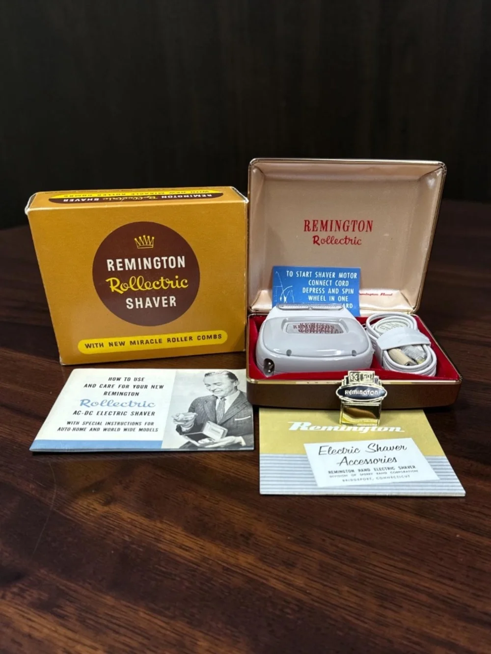 1950’s REMINGTON Rollectric Shaver with New Miracle Roller Combs